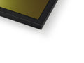 A picture frame with a black rectangle shaped LCD screen on it.
