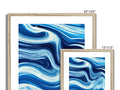 A photo on a glass wall of blue and yellow picture frames with a blue frame and