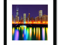 Art print with Chicago skyline on it with a small dog and buildings in a background.