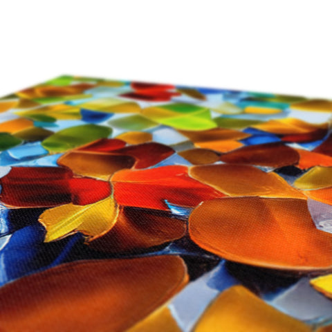 A picture of tile on a glass table covered in colored colors of the world.