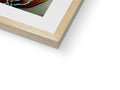 A wooden photograph frames that are in a clear frame that is filled with art.