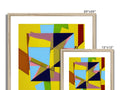 A collection of art frames framed on a wall, several different shapes and sizes and colors