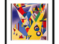 A geometric art print is framed next to several colorful shapes.