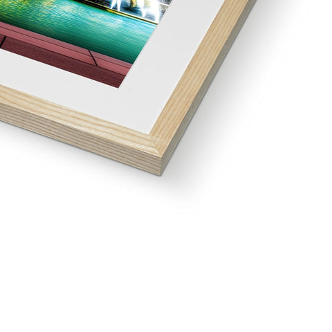 A photo of a single shot in a photo frame with two wood frames