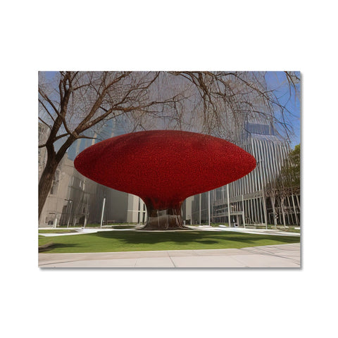 A large round bean pillow sitting next to a glass sculpture and a red mitten tree