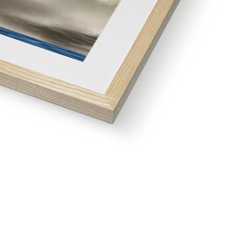 A blue image of an abstract image sitting above a green picture frame with a picture print