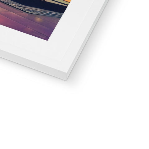 An imac photo on a frame that has a white photo on top of it