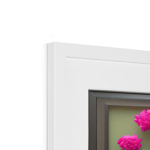 White picture frames decorated with a dog and flowers standing in front of a window.