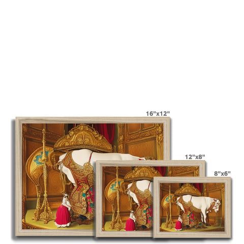 The picture frames sit on a wooden display table with a couple of cards, paper,