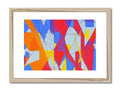 A metal print of colorful designs on a framed piece of art.
