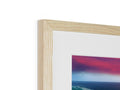 A wooden frame with a beautiful picture framed in it in a white wooden background.