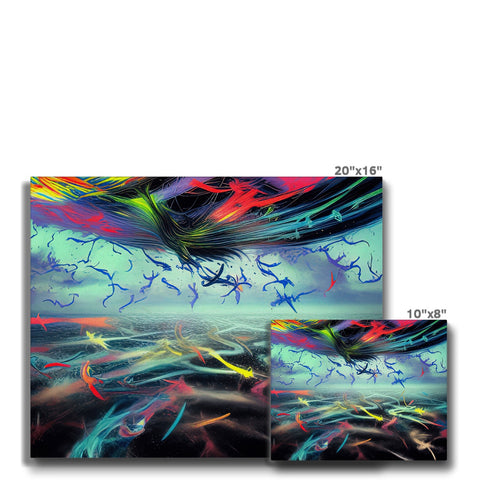 A stack of art prints on colorful glass on a white and red sheet.