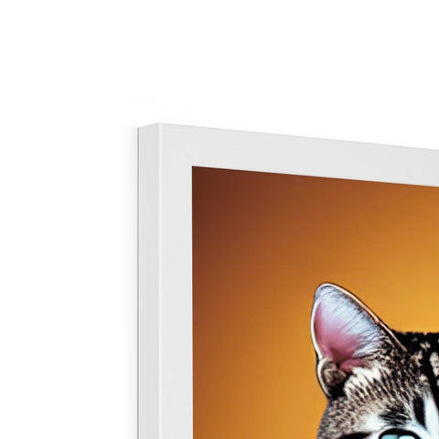 A cat peeking out of a flat panel display on a photo frame.