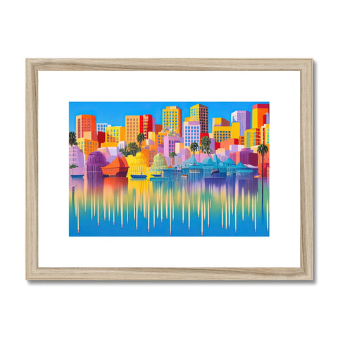 The colorful view of a city skyline from a framed print and a black framed photo of