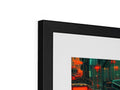 A framed picture of an abstract image sitting on a photo shelf in a living room.
