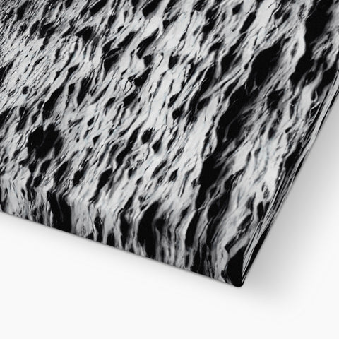 The wall is a textured grey object on a white carpet.