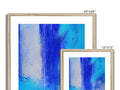 Three art prints on a framed piece of art on a wall with a blue background in
