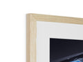 a large picture frame with wood on it lying on top of a white top