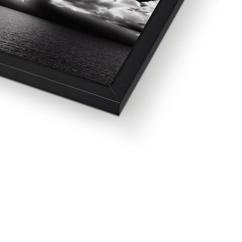 A view of a photo frame on top of a wall on a black and white photo