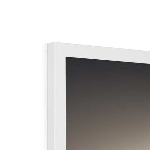 An imac monitors display is sitting on the wall between two white squares of glass.