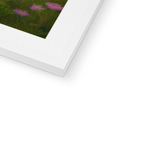 White picture frame showing a picture of grass in the background sitting in a white room.