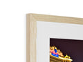 A picture inside a photo frame is shown in a wooden frame.