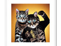 Two cats sit on a picture on an art print.