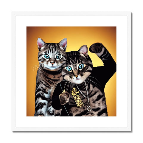 Two cats sit on a picture on an art print.