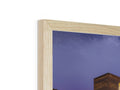 Picture of a wooden fireplace holding a gold photo frame in an empty white section of a
