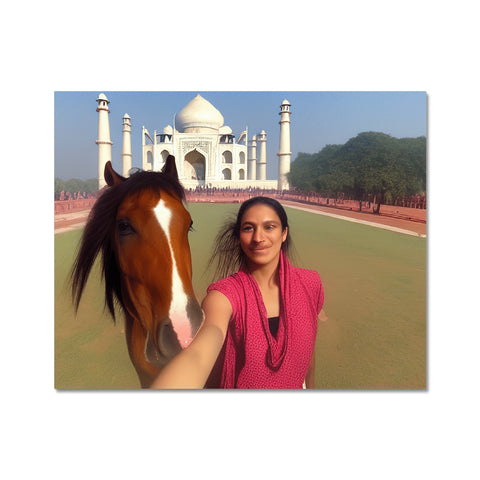A woman standing on top of a horse near a beautiful picture of country.