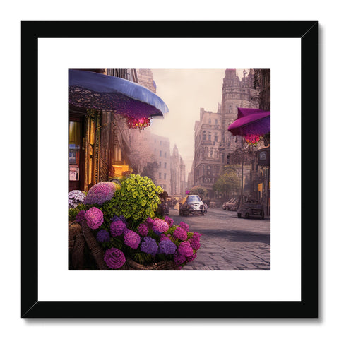 A framed photograph of a street of a city with flowers, people and trees and colorful