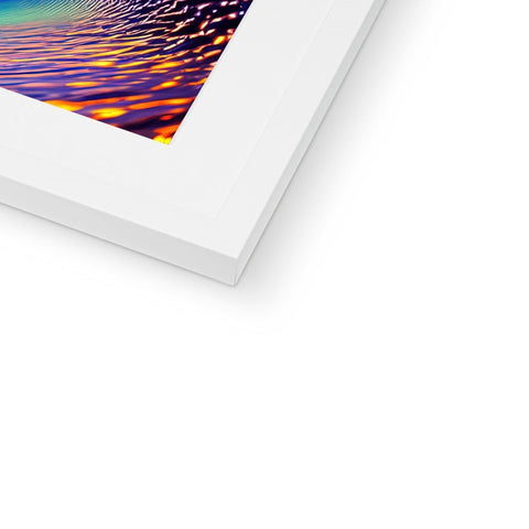 An art print of an  imac on a picture frame sits on top of a