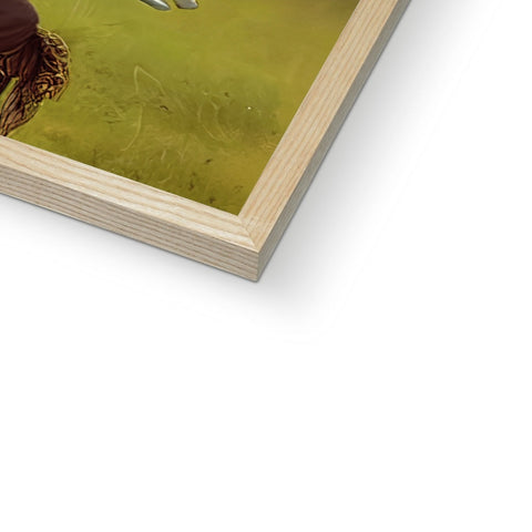 A close up of a picture with wood frame holding a book on top of it.