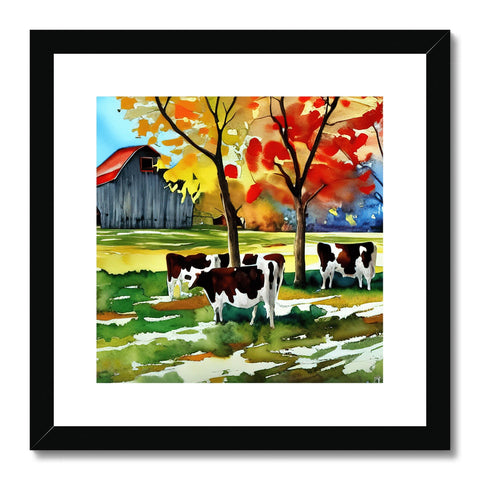 Several cows grazing by a small barn with different colors of cows under a tree.