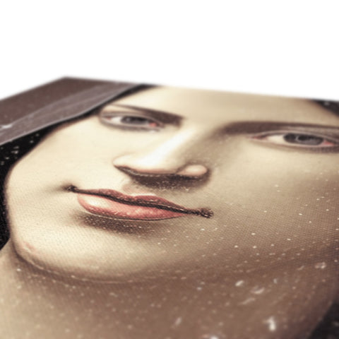 a piece of cardboard with a picture of a face on it