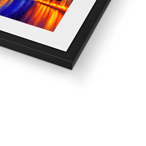 An abstract photo is on a metal frame on a table.