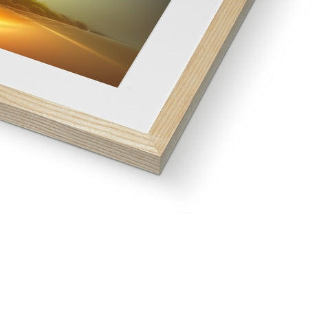 A picture frame in a wood frame is seen with a photograph.
