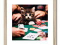 A cat playing to the poker game with a framed photo of a white ring on a