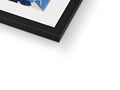 A picture frame with a photo holding a blue  art piece in a frame on a