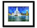 A blue and gold framed picture of a city skyline topped with waterfalls.