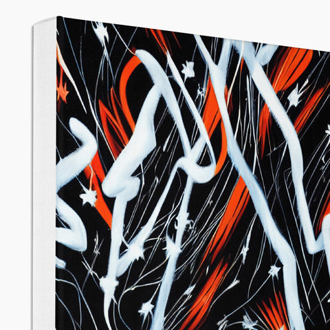 An abstract art print of graffiti on a book cover displayed on a table.