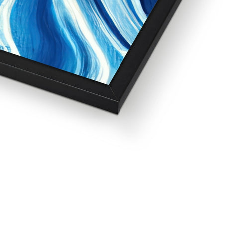 A small picture frame with white artwork is in a white frame in a blue background inside