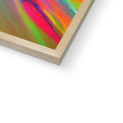 An art print of a rainbow sitting on top of a wooden frame.