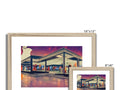 An attractive looking store with white walls and a hanging photo frame for some items.�