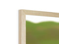 A view of a picture frame on top of a table with one of it standing upright