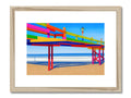 A wooden frame that is close to a beach with a colorful and colorful ocean.