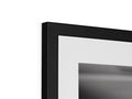 A picture frame with a close up of a black and white picture of a mirror on