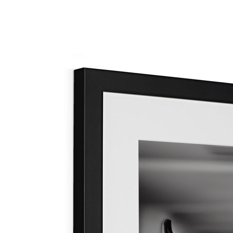 A picture frame with a close up of a black and white picture of a mirror on