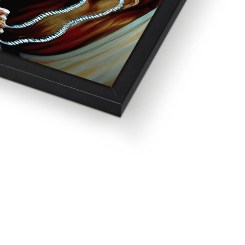 a metal picture frame with a large portrait on top of it with a silver necklace hanging