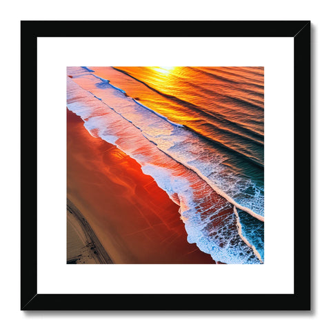 A framed framed photo of waves on a beach with small sun setting in the background.